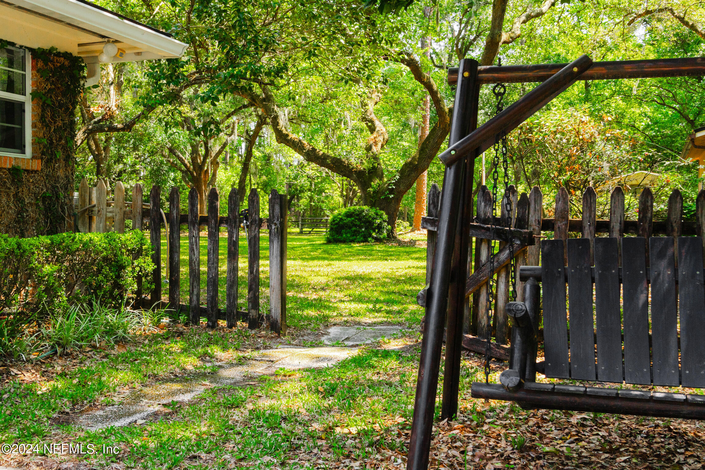 3153 Tiger Hole Road Jacksonville, FL 32216 - Photo 37 of 68 View from driveway into backyard