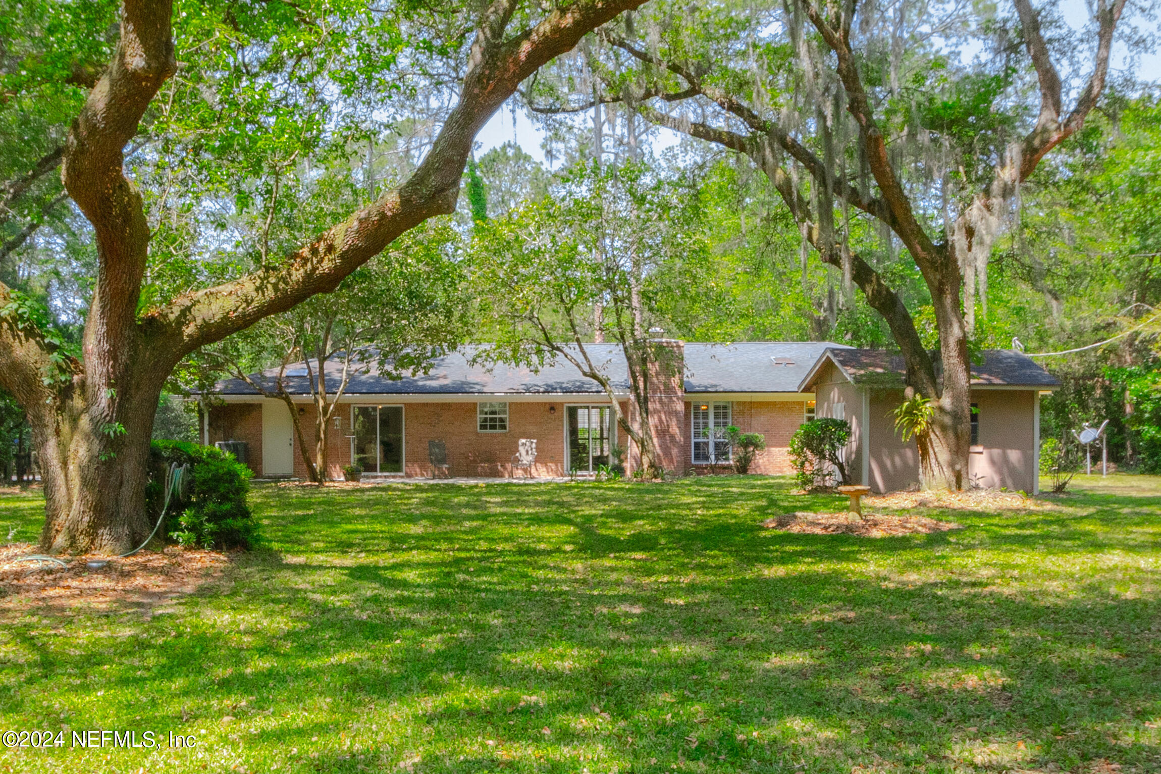 3153 Tiger Hole Road Jacksonville, FL 32216 - Photo 43 of 68 front view of a house with a yard