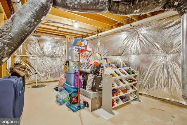 a view of an empty room with stairs