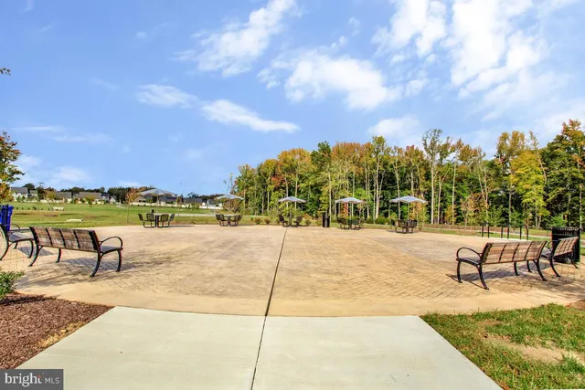 a view of an outdoor space and tennis court