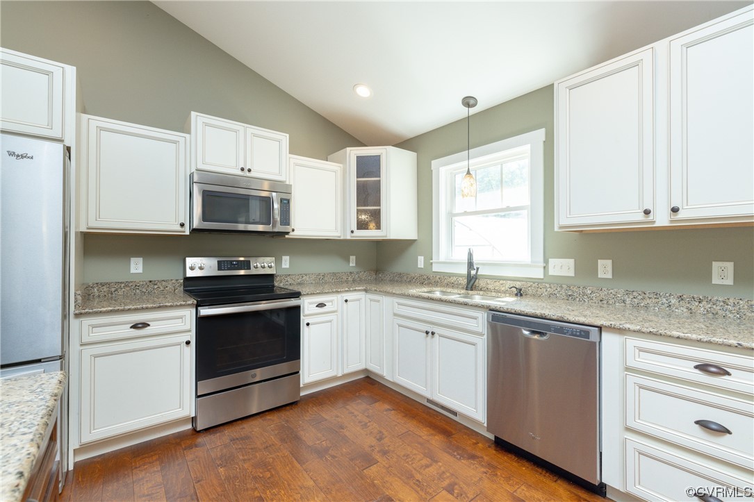 2624 Academy Road Powhatan, VA 23139 - Photo 8 of 46 Recessed lights and pendant light over double sink