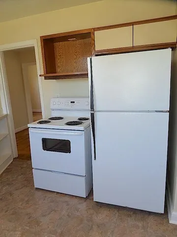 a utility room with washer and dryer