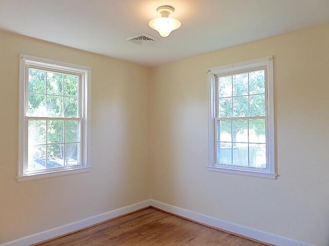 429 Fieldale Road Northeast Roanoke, VA 24012 - Photo 22 of 24 a view of a room with wooden floor and windows