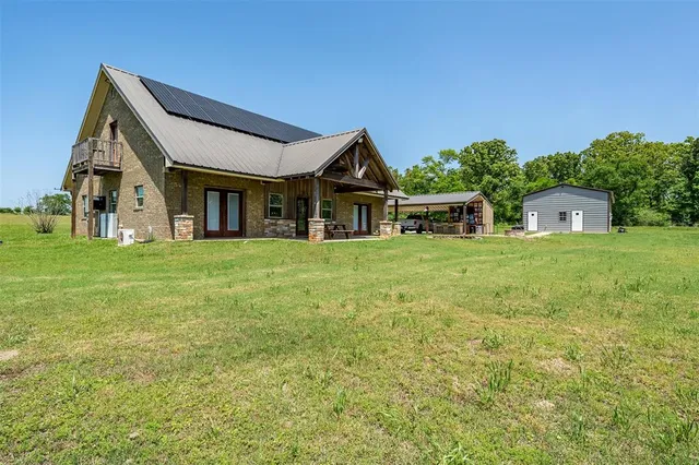a house view with a outdoor space