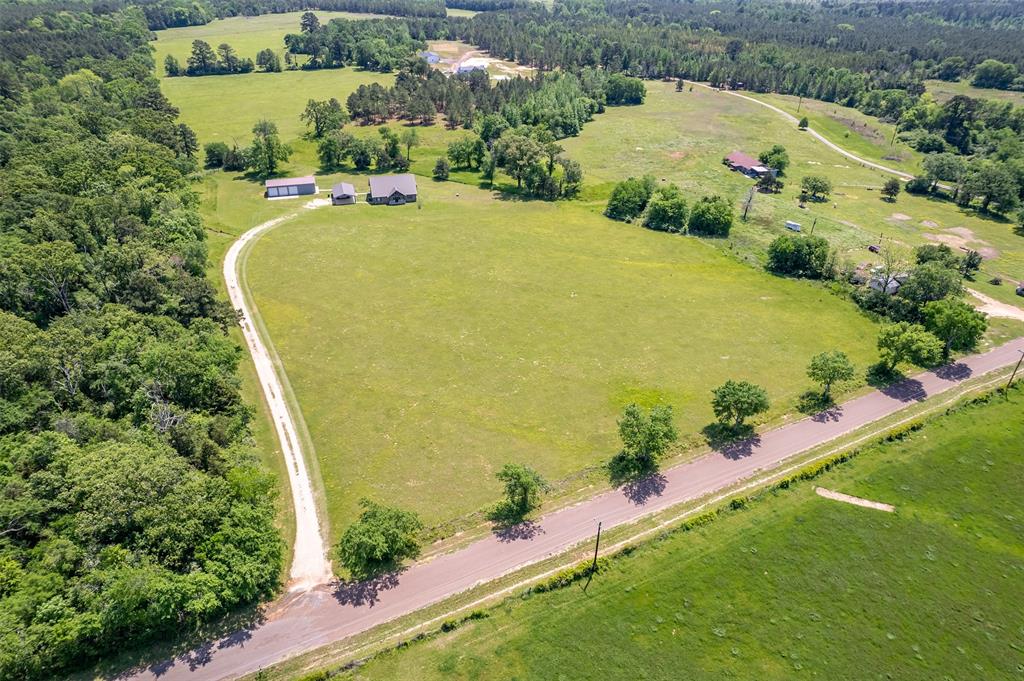 13043 County Road 4182 Henderson, TX 75654 - Photo 36 of 40 an aerial view of a house