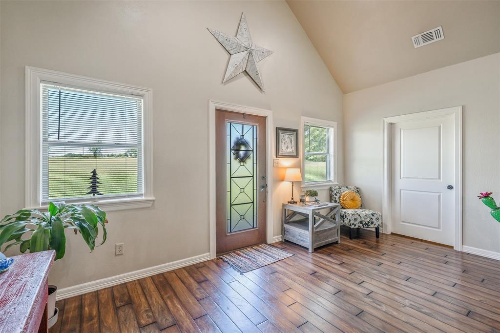 13043 County Road 4182 Henderson, TX 75654 - Photo 7 of 40 a living room with furniture and a window