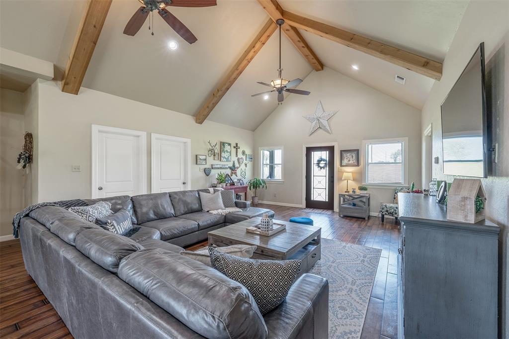 13043 County Road 4182 Henderson, TX 75654 - Photo 9 of 40 a living room with furniture and wooden floor