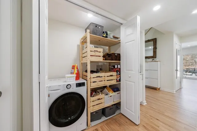 a view of a livingroom with furniture and wooden floor