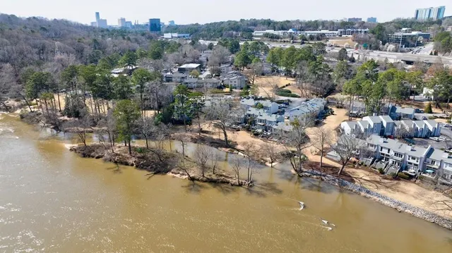 an aerial view of house with yard