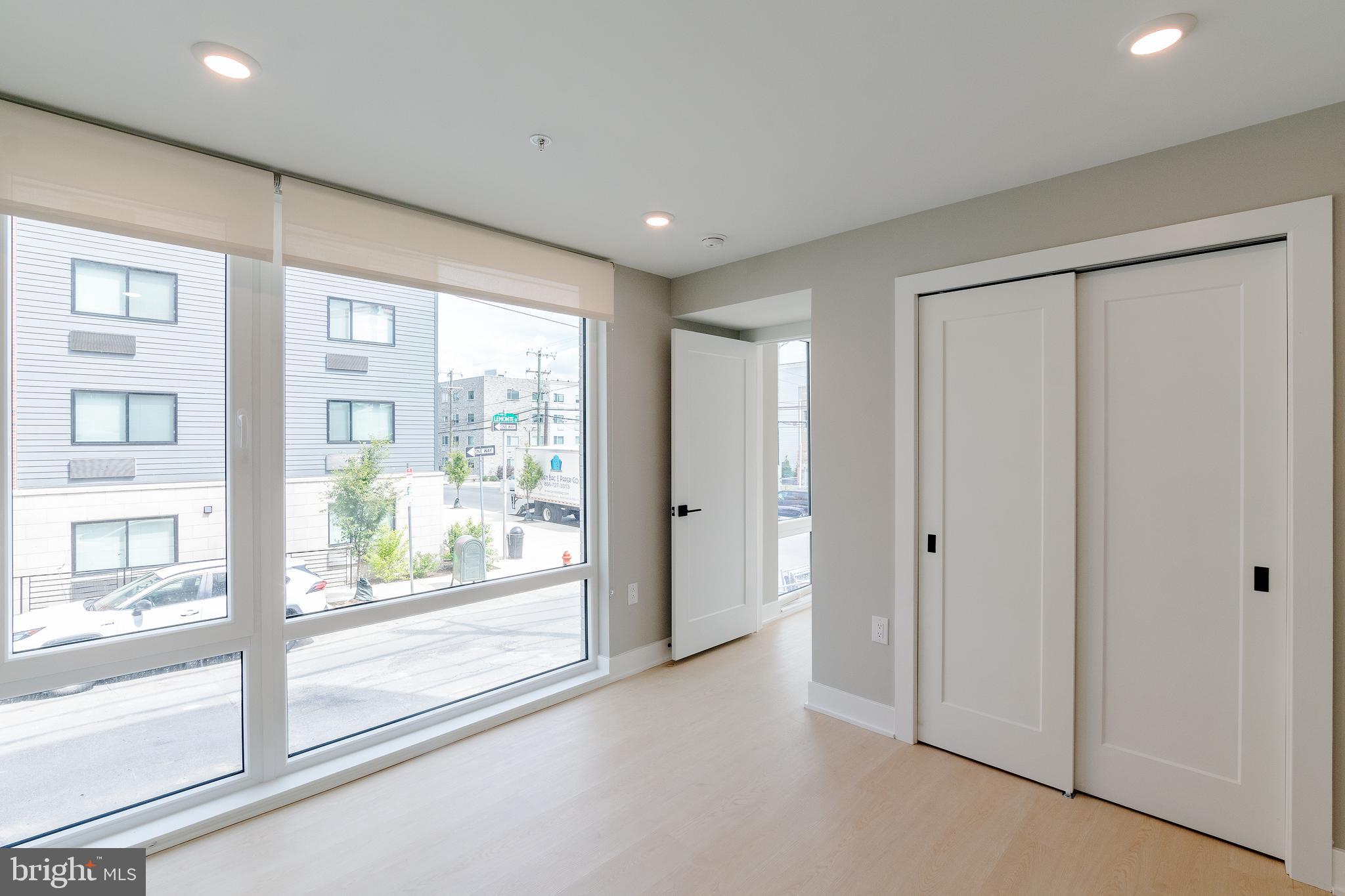 6604 Ridge Avenue, Unit 305 Philadelphia, PA 19128 - Photo 4 of 17 a view of hallway with windows