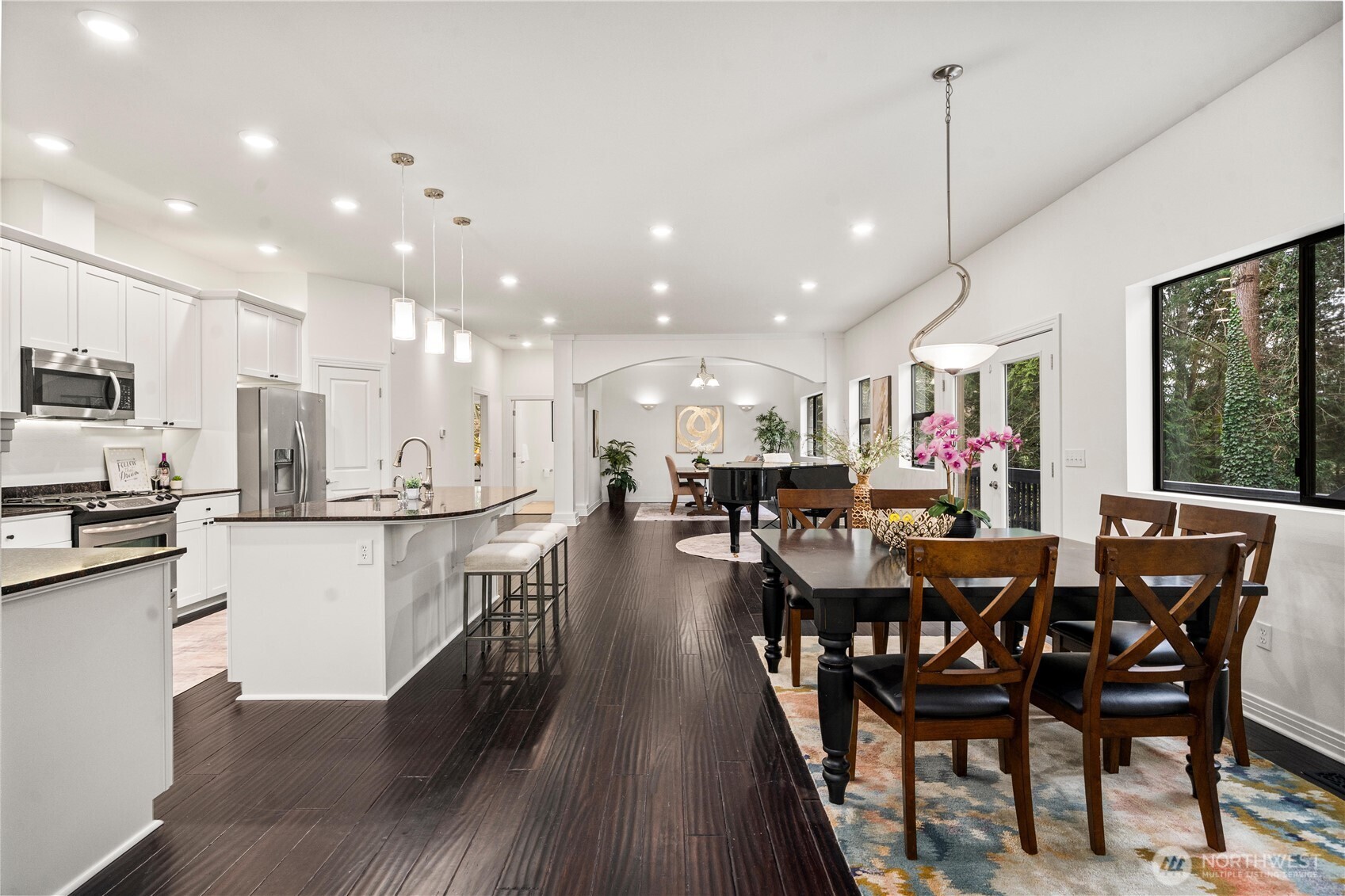 20709 Northeast 79th Street Redmond, WA 98053 - Photo 12 of 38 a view of a dining area with furniture and wooden floor