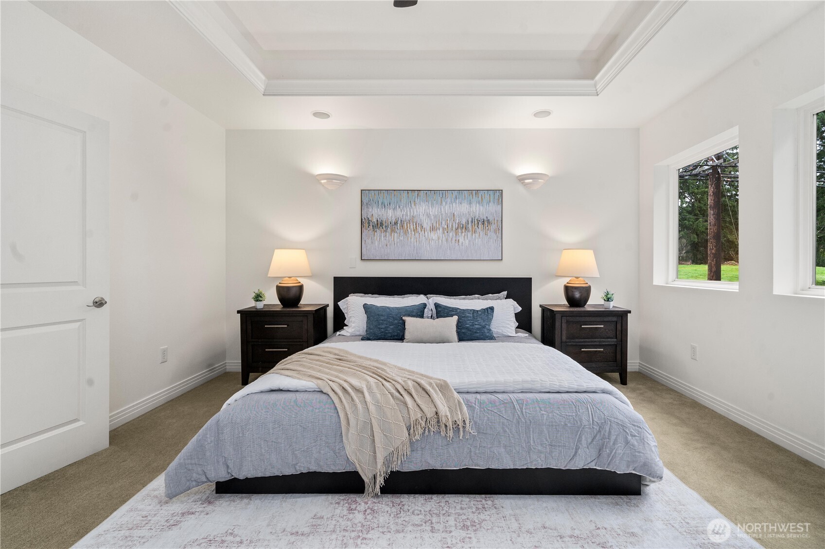 20709 Northeast 79th Street Redmond, WA 98053 - Photo 16 of 38 a bedroom with a bed and wooden floor