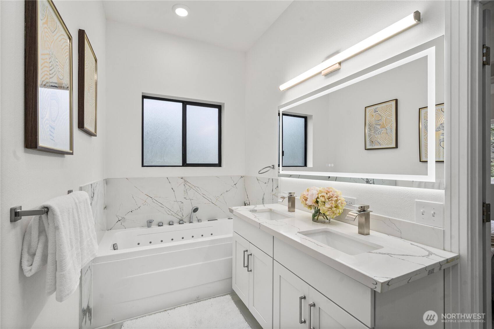 20709 Northeast 79th Street Redmond, WA 98053 - Photo 17 of 38 a bathroom with a sink vanity and mirror