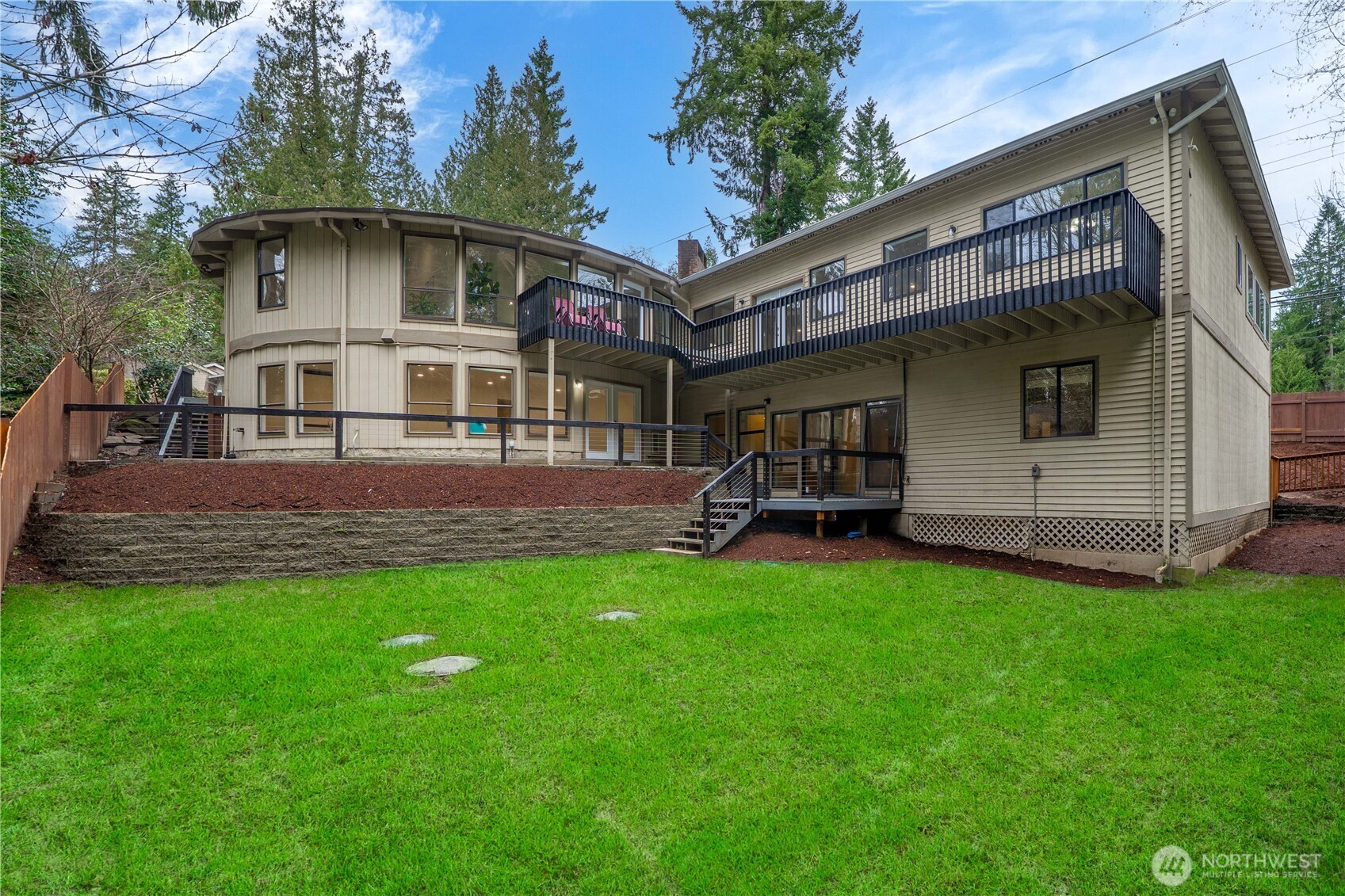 20709 Northeast 79th Street Redmond, WA 98053 - Photo 2 of 38 a view of a house with a yard