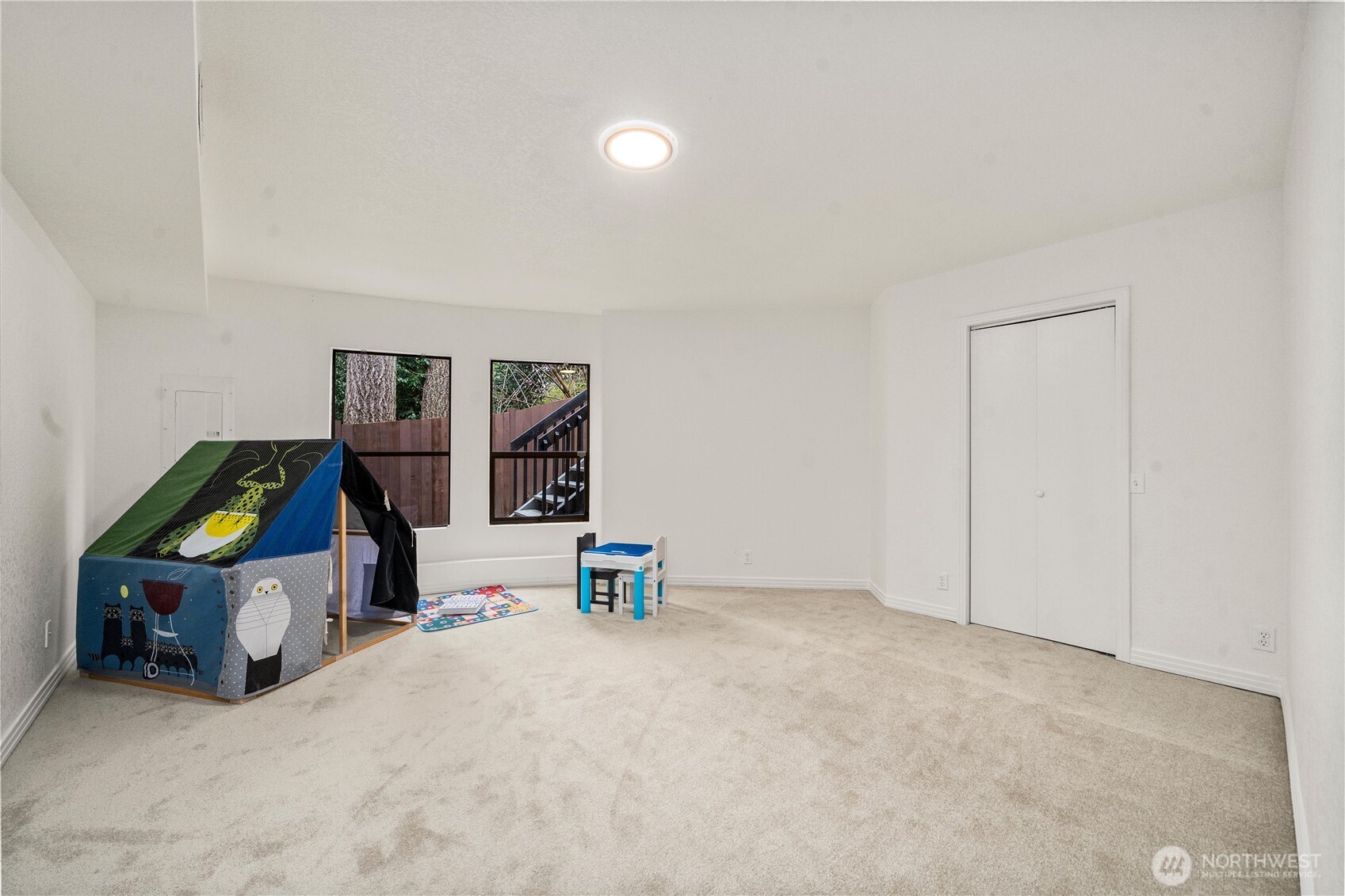 20709 Northeast 79th Street Redmond, WA 98053 - Photo 26 of 38 a view of a bedroom with workspace