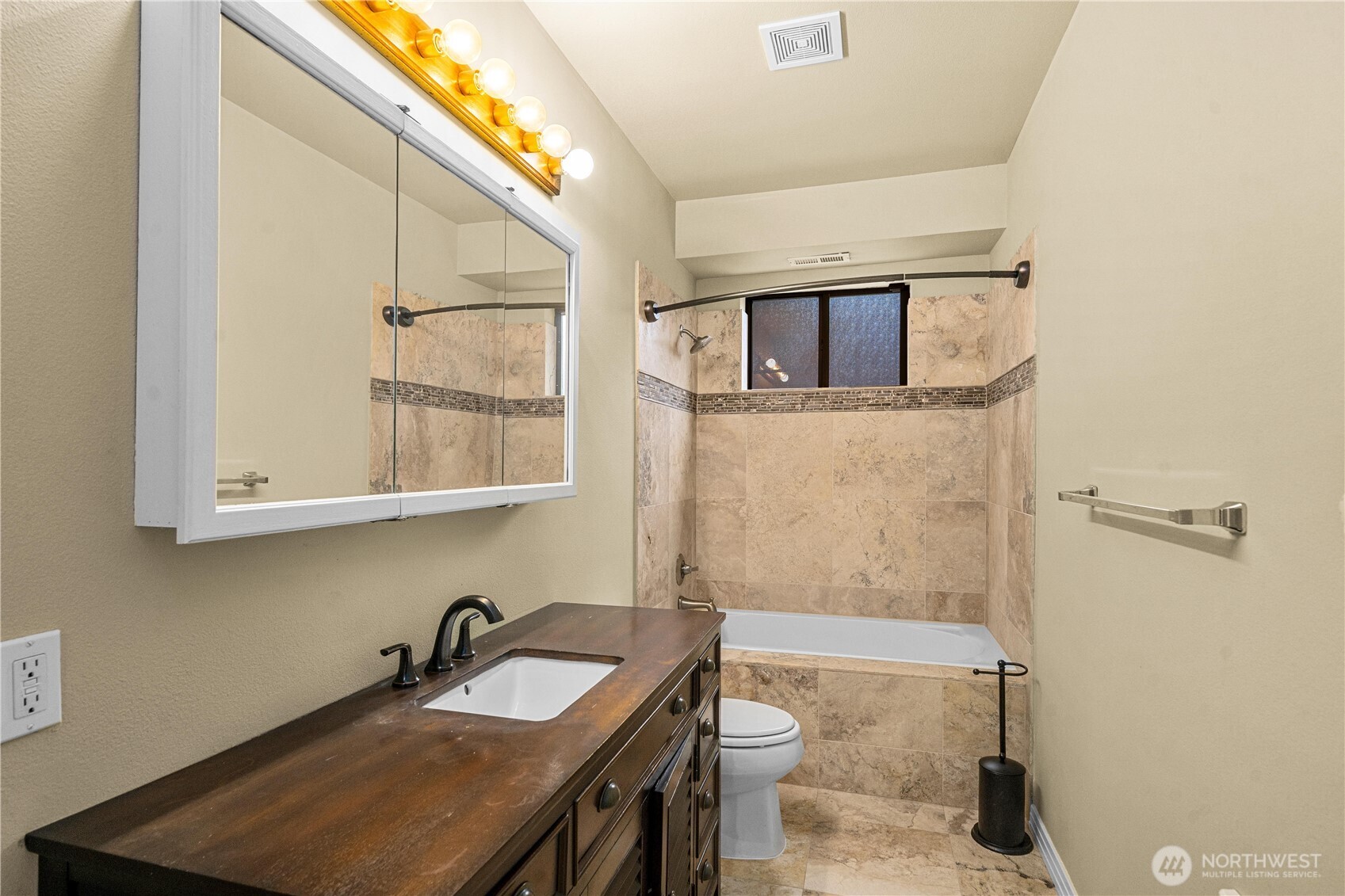 20709 Northeast 79th Street Redmond, WA 98053 - Photo 32 of 38 a bathroom with a granite countertop sink toilet and mirror