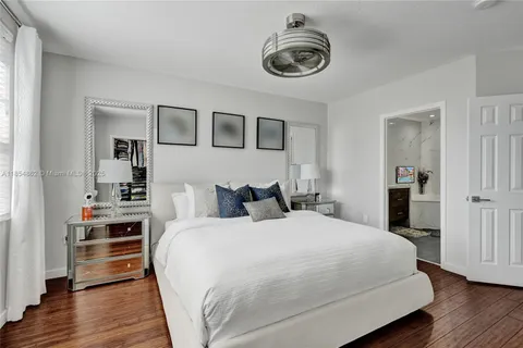 a bathroom with a bathtub and a sink