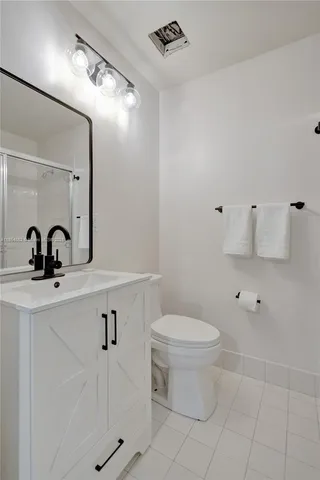 a front view of a white building