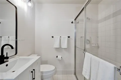 a small white building with a outdoor space