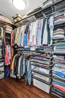 a patio with a patio table and chairs
