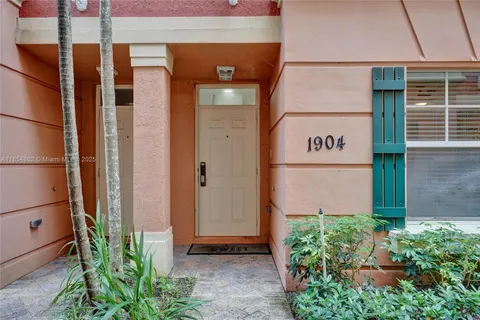a outdoor space with a couch and chairs