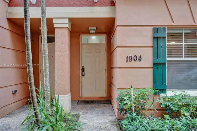 a outdoor space with a couch and chairs