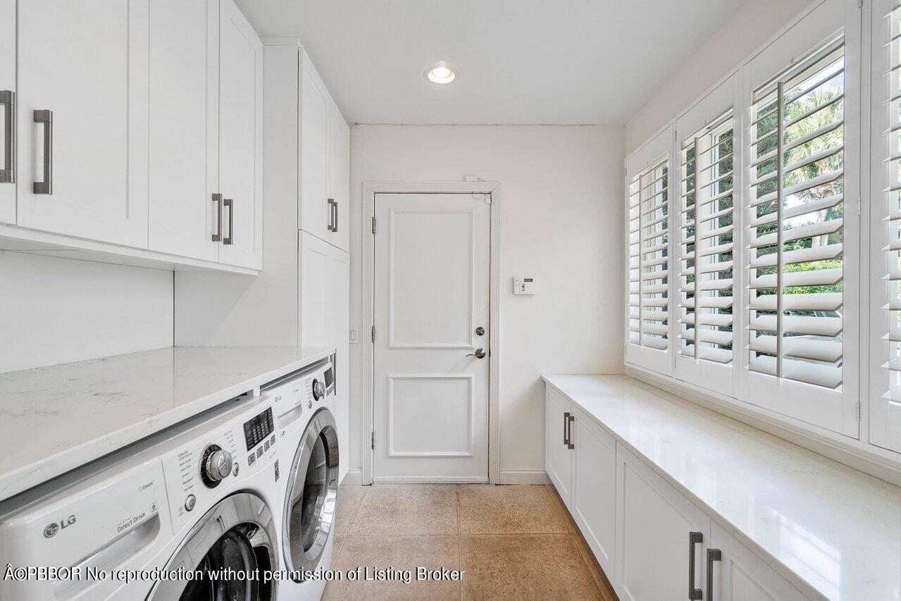 256 Mockingbird Trail Palm Beach, FL 33480 - Photo 26 of 31 a view of a kitchen with a sink