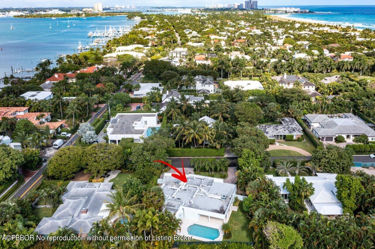 256 Mockingbird Trail Palm Beach, FL 33480 - Photo 30 of 31 an aerial view of residential houses with outdoor space and swimming pool
