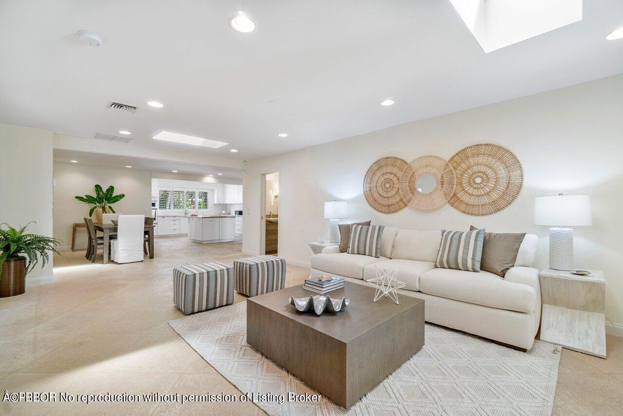 256 Mockingbird Trail Palm Beach, FL 33480 - Photo 4 of 31 a living room with furniture and a table