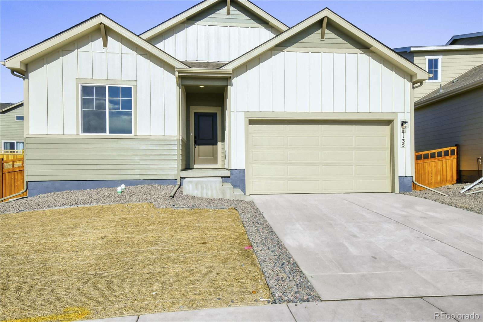 4135 Runyon Street Brighton, CO 80601 - Photo 1 of 27 a view of the house with a outdoor space