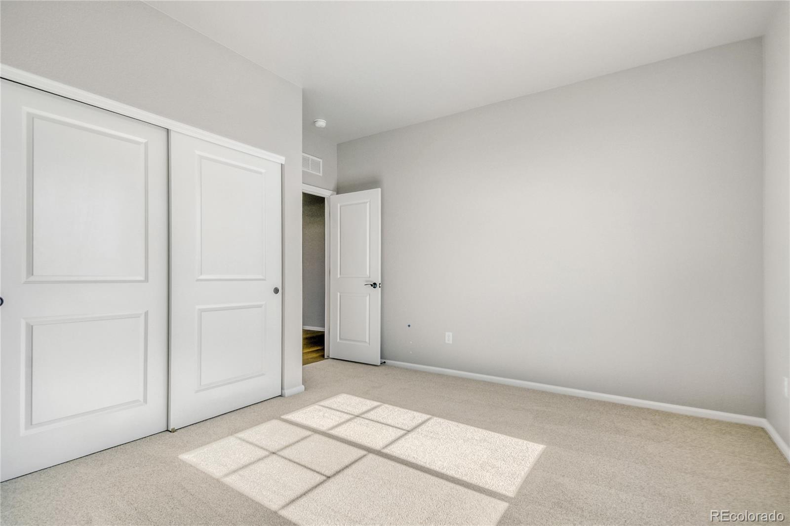 4135 Runyon Street Brighton, CO 80601 - Photo 22 of 27 a view of an empty room