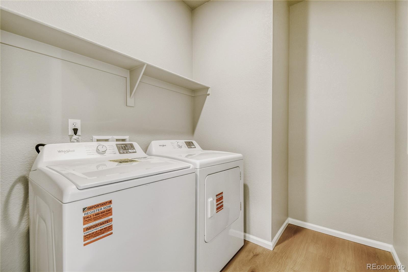 4135 Runyon Street Brighton, CO 80601 - Photo 27 of 27 a utility room with dryer and washer