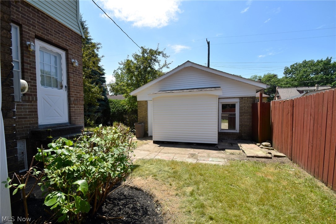 1076 Parkside Road Cleveland, OH 44108 - Photo 49 of 49 Garage featuring a lawn