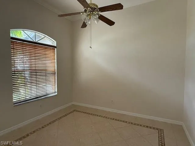 a view of a room that has a window in it