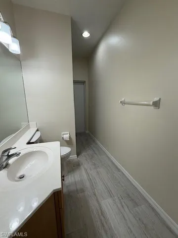 a bathroom with a sink and a toilet