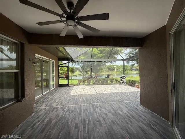 a view of outdoor space with wooden floor