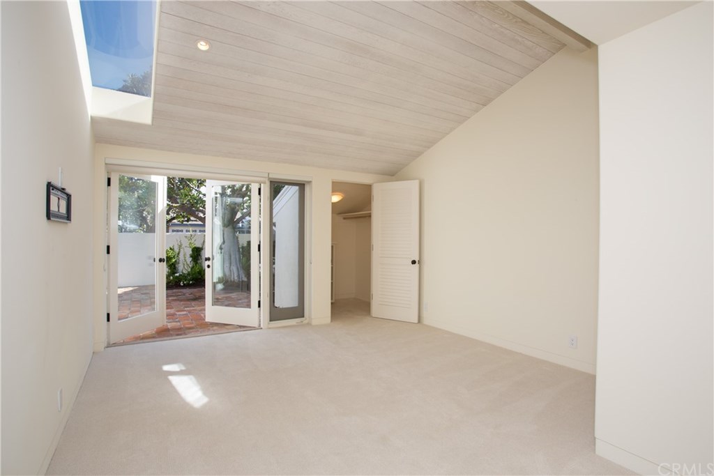 1 Seafaring Drive Corona del Mar, CA 92625 - Photo 12 of 25 an empty room with windows and entrance