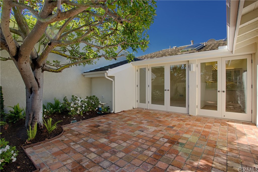 1 Seafaring Drive Corona del Mar, CA 92625 - Photo 14 of 25 a front view of a house with garden