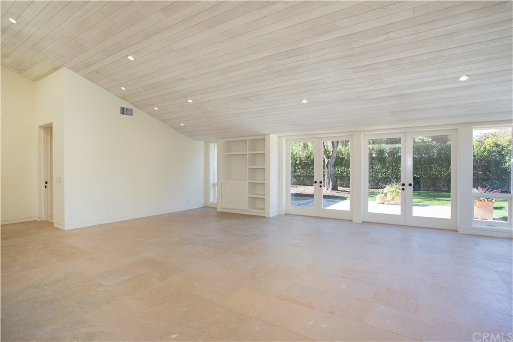 1 Seafaring Drive Corona del Mar, CA 92625 - Photo 5 of 25 a view of a big room with windows and chandelier fan