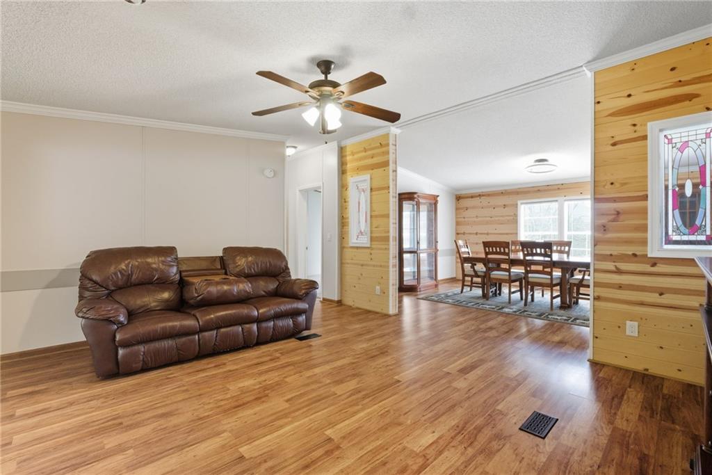 294 Old Ball Ground Road Canton, GA 30115 - Photo 15 of 40 a living room with furniture and wooden floor