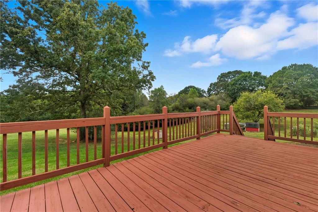 294 Old Ball Ground Road Canton, GA 30115 - Photo 37 of 40 a view of balcony with wooden floor and fence