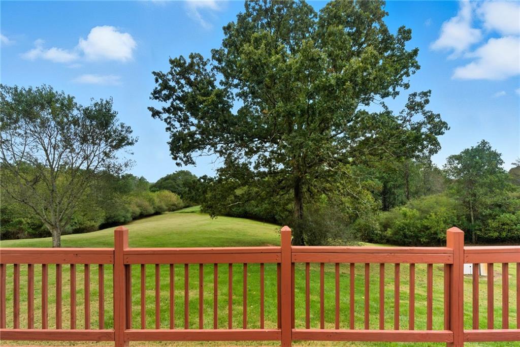 294 Old Ball Ground Road Canton, GA 30115 - Photo 38 of 40 a view of a wooden roof and yard