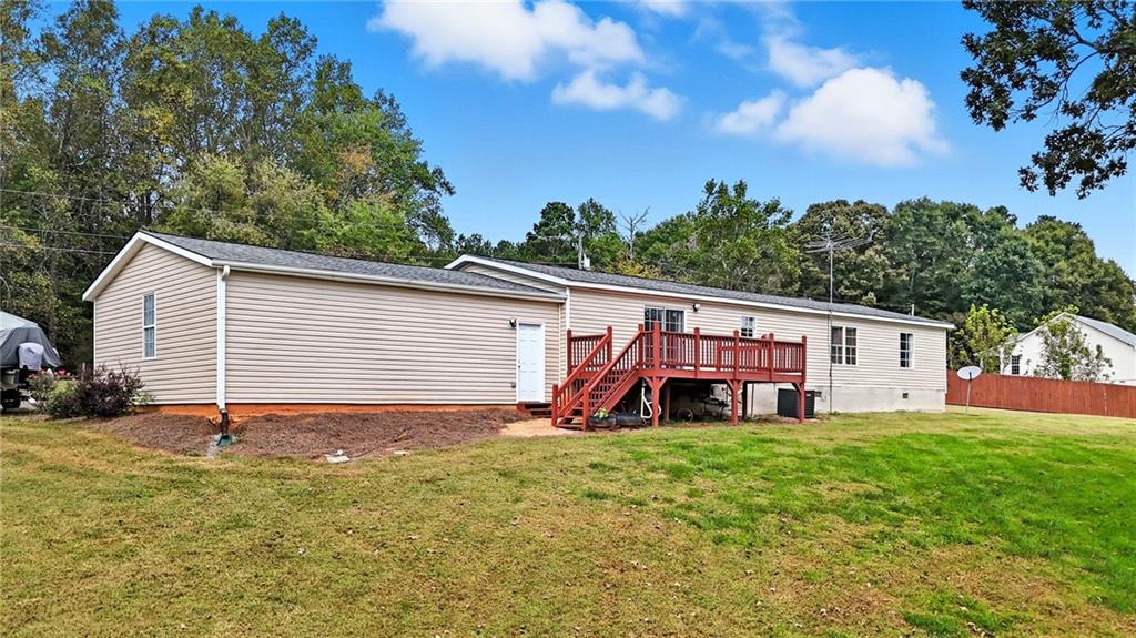 294 Old Ball Ground Road Canton, GA 30115 - Photo 7 of 40 a view of a house with a yard