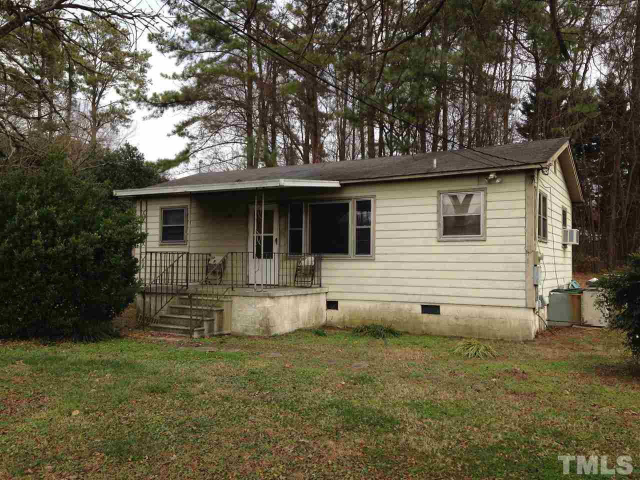 121 New Rand Road Garner, NC 27529 - Photo 2 of 4 a view of a house with a yard