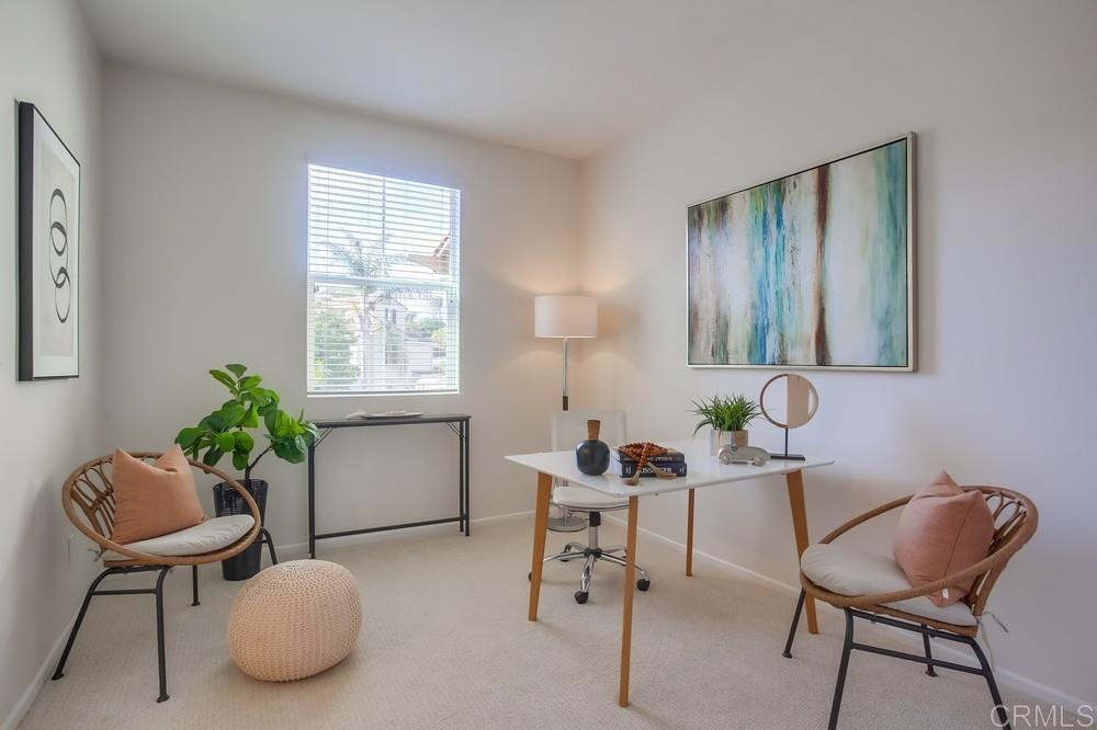 4142 Karst Road Carlsbad, CA 92010 - Photo 27 of 31 a living room with furniture and a potted plant
