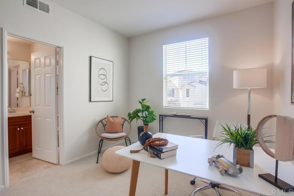 4142 Karst Road Carlsbad, CA 92010 - Photo 28 of 31 a living room with furniture and a potted plant
