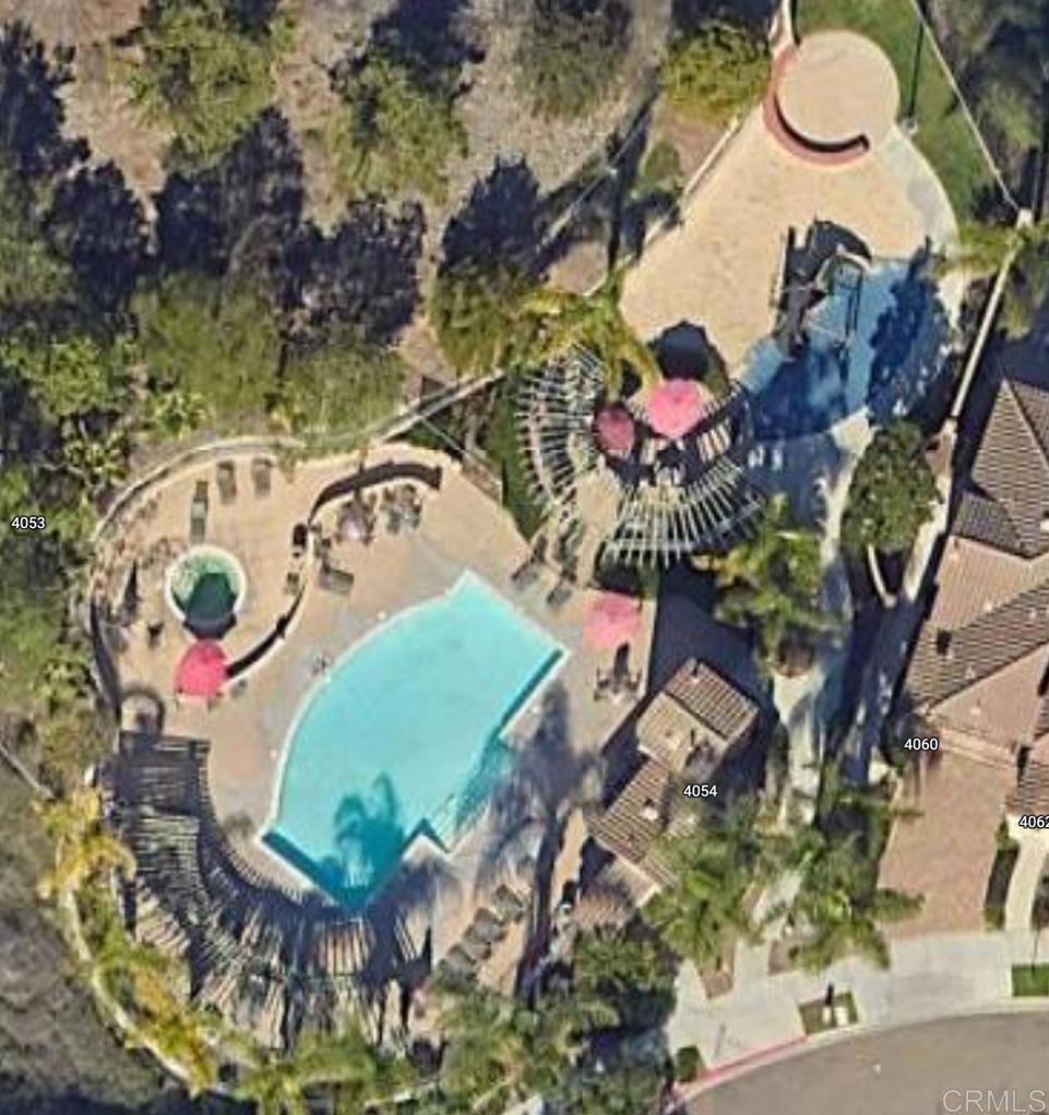 4142 Karst Road Carlsbad, CA 92010 - Photo 30 of 31 a view of swimming pool with a dining table and chairs