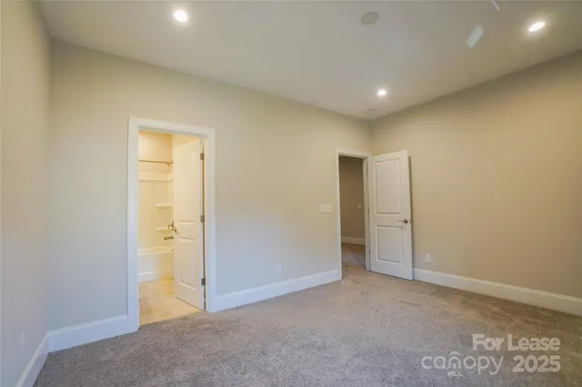 a view of hallway with a large window