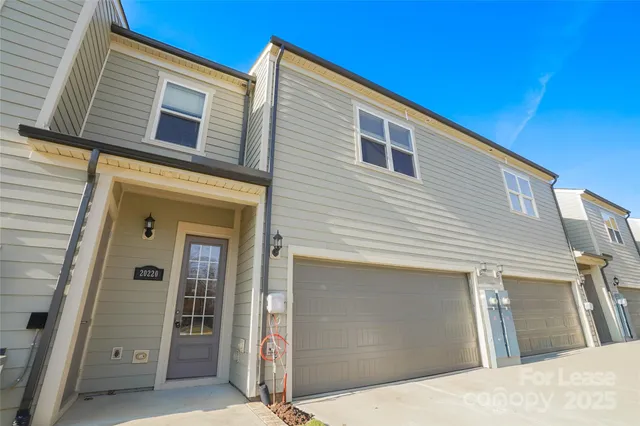 a view of a house with more windows and entryway