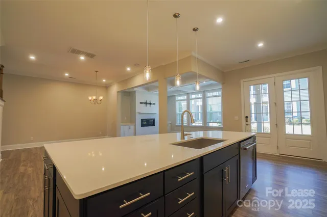 a bathroom with a sink double vanity and a tub